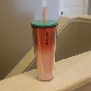 Starbucks red, pink, and green tumbler